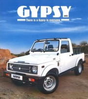 GYPSY 4WD на синем фоне: открытая белая машина