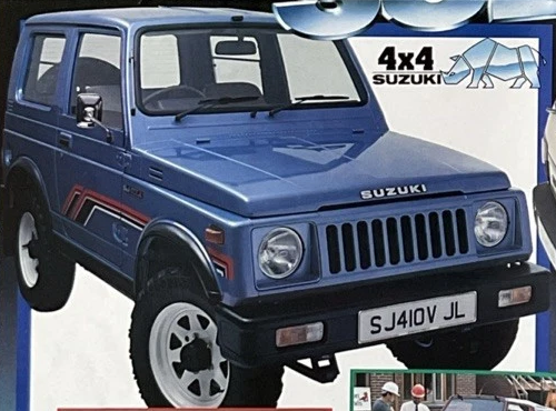 SJ410V JL, Великобритания, 01.04.1986: чёрные штрихи с красной окантовкой на синем