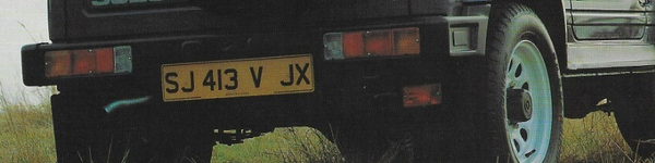 SJ413V JX: цветной задний вид бампера первого типа